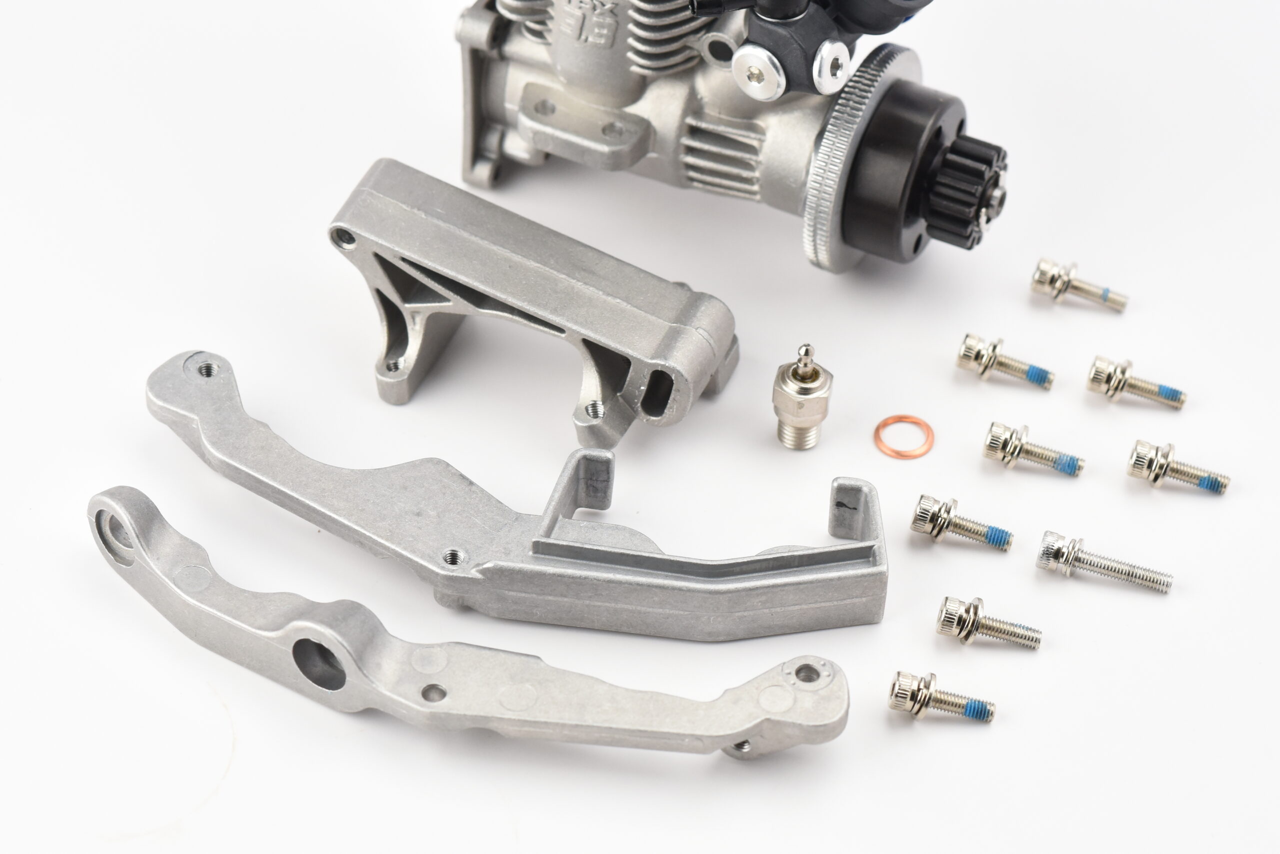 Traxxas Nitro Revo 3.3 Engine (2) Traxxas Nitro Revo 3.3 ENGINE Include Carb glow plug gear, Engine Mounts, Screws