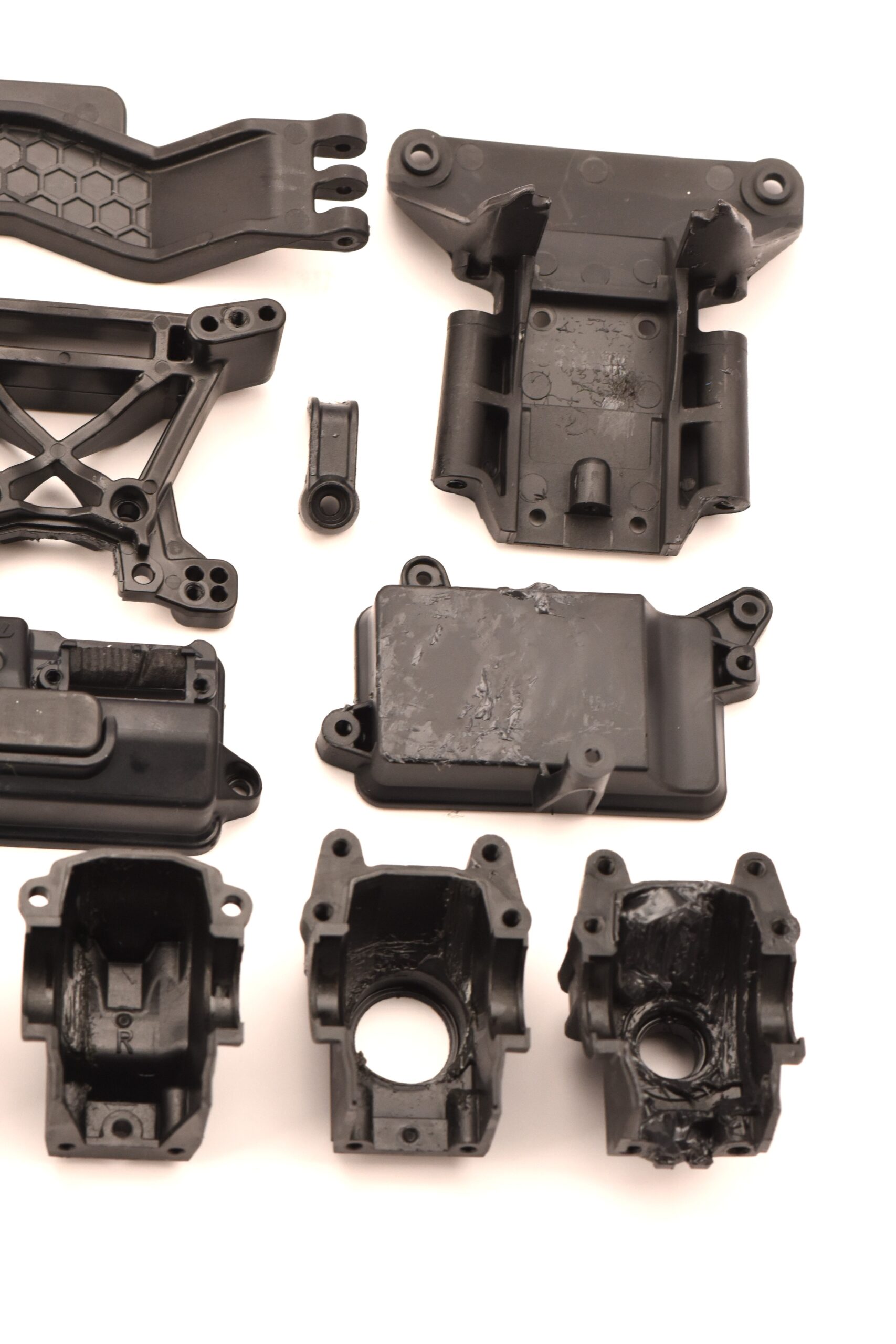 Traxxas Ultimate Rustler Plastic Chassis Parts (5) Traxxas RUSTLER ULTIMATE Receiver Box, bulkhead, towers, batty holder, Sway Bars