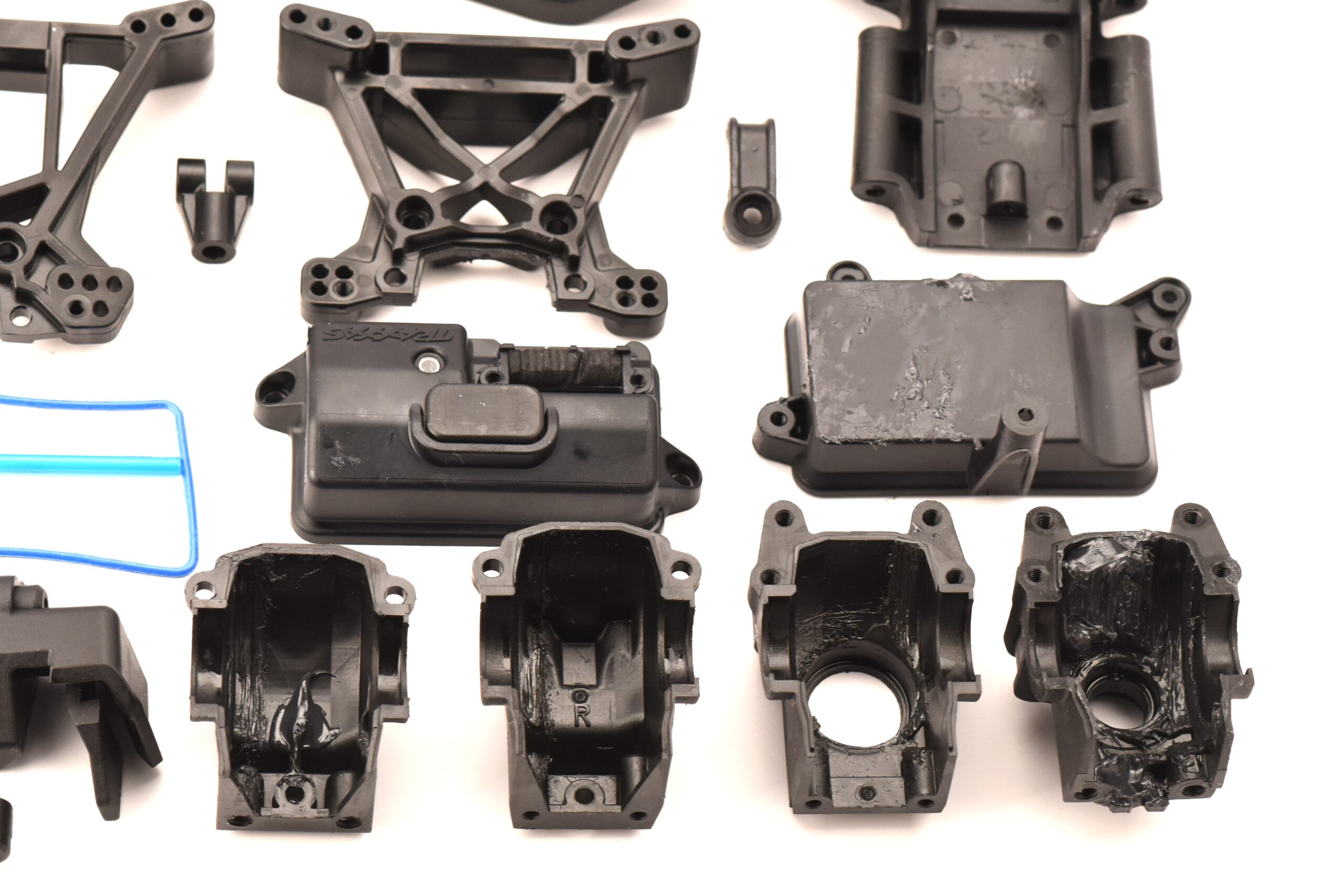 Traxxas Ultimate Rustler Plastic Chassis Parts (6) Traxxas RUSTLER ULTIMATE Receiver Box, bulkhead, towers, batty holder, Sway Bars