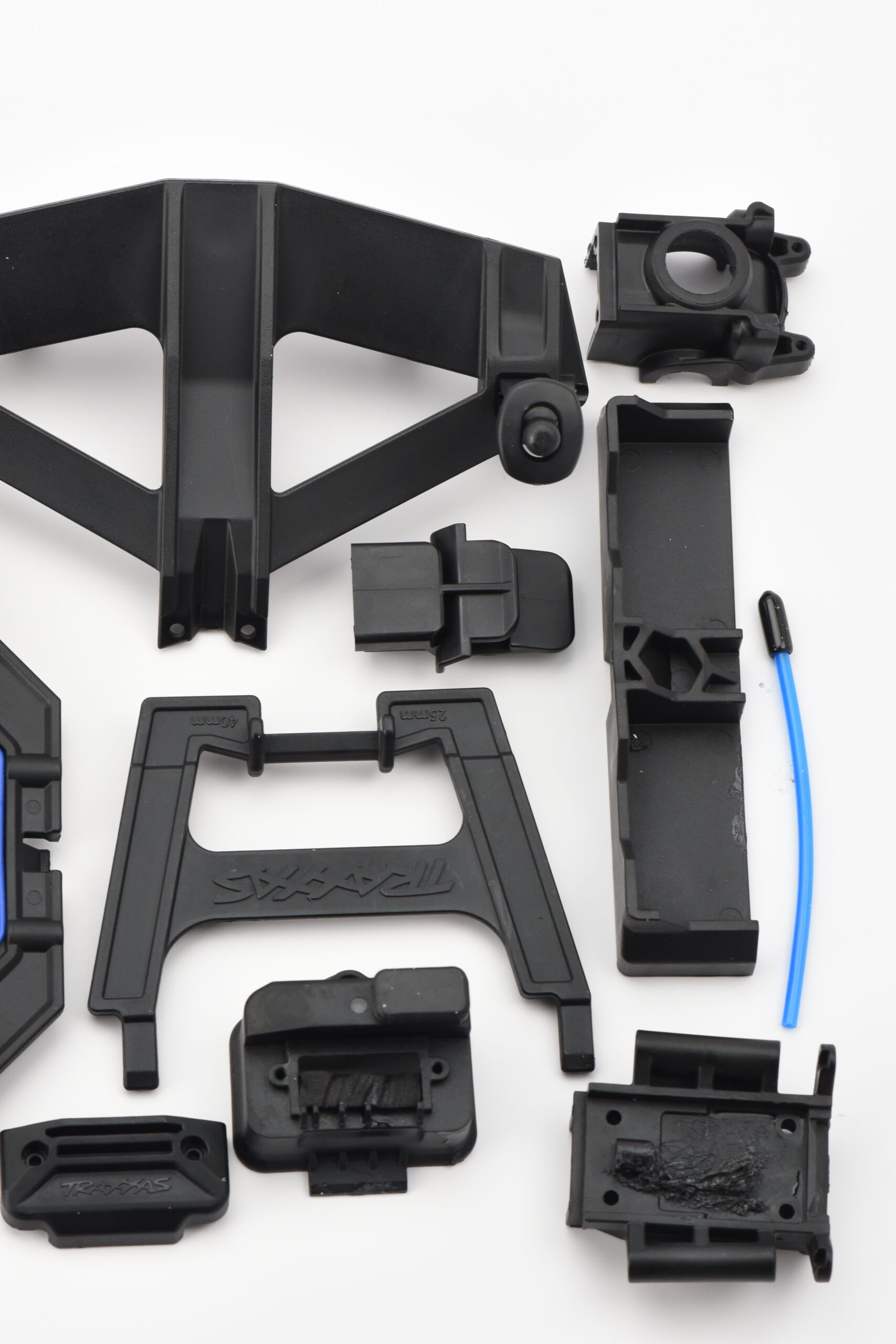 Traxxas XO-1 Plastic Chassis Parts (4) Fits Traxxas XO-1 - PLASTIC SET bulkhead retainers battery hold-down, Body Mount